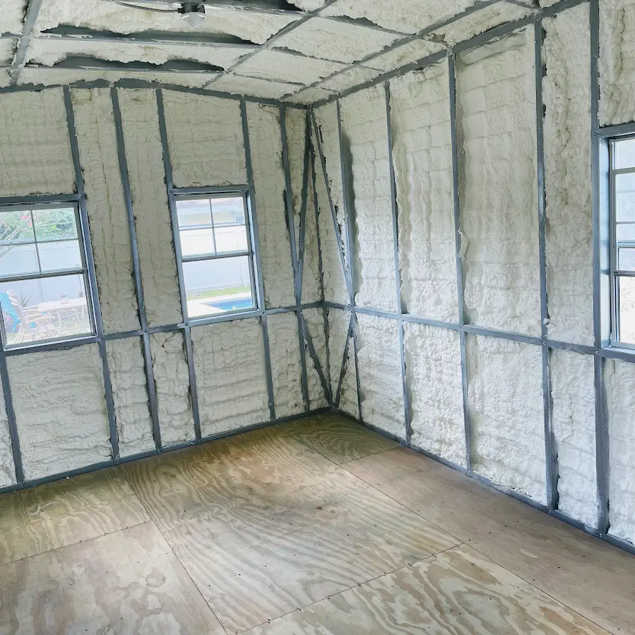 Closed-cell spray foam insulation applied to wall cavities in a residential project in Sparks